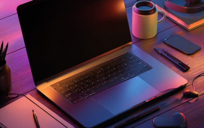 modern-tech-workspace-laptop-neon-lighting